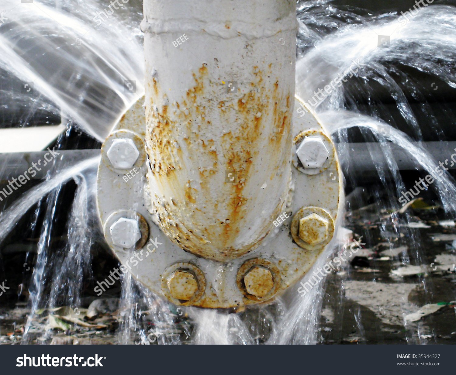 stock-photo-leaking-pipe-35944327-885338673.jpg